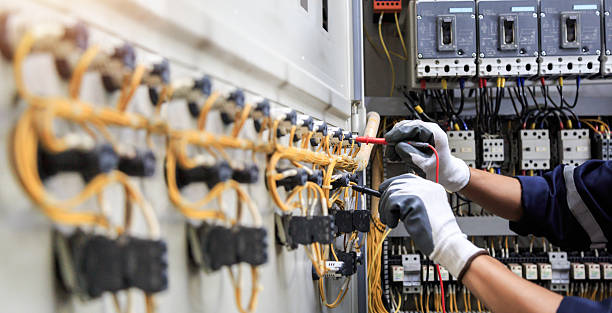 Professional Electrical Panel Upgrade technician working in Polk County County, IA